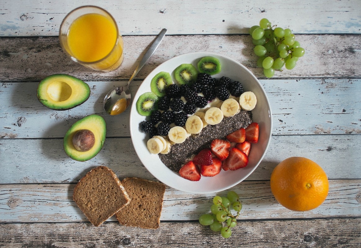 Healthy meal planning bowl with fresh vegetables and grains